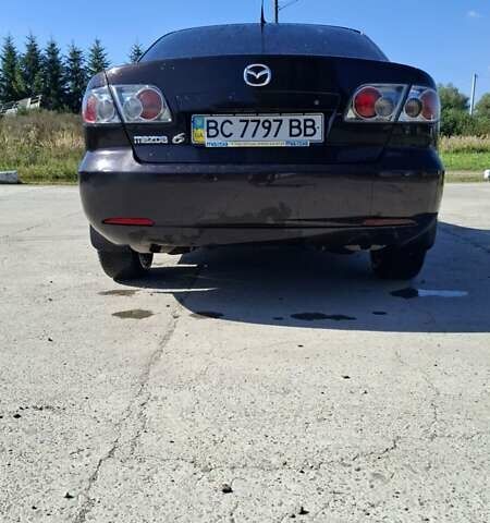 Фиолетовый Мазда 6, объемом двигателя 2 л и пробегом 265 тыс. км за 3500 $, фото 1 на Automoto.ua