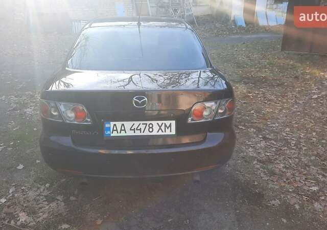 Фиолетовый Мазда 6, объемом двигателя 2 л и пробегом 200 тыс. км за 5200 $, фото 4 на Automoto.ua