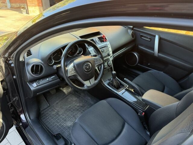 Фиолетовый Мазда 6, объемом двигателя 1.8 л и пробегом 80 тыс. км за 8900 $, фото 9 на Automoto.ua