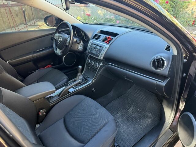 Фиолетовый Мазда 6, объемом двигателя 1.8 л и пробегом 80 тыс. км за 8900 $, фото 16 на Automoto.ua