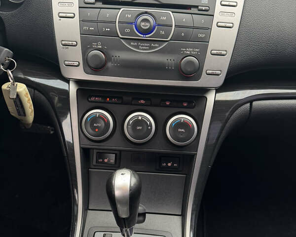 Фиолетовый Мазда 6, объемом двигателя 2 л и пробегом 173 тыс. км за 5500 $, фото 7 на Automoto.ua