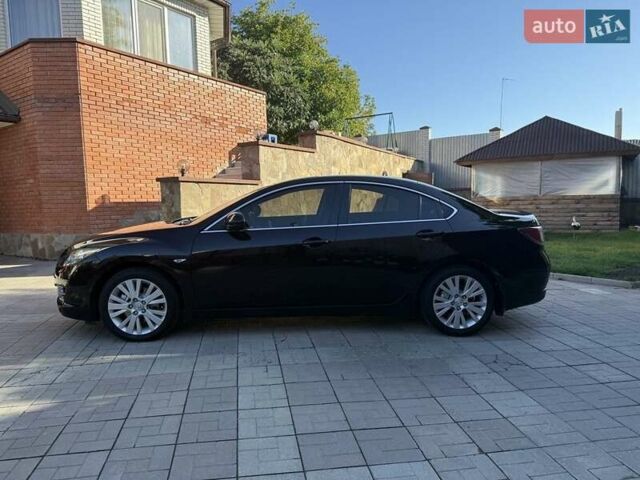 Фиолетовый Мазда 6, объемом двигателя 1.8 л и пробегом 80 тыс. км за 8900 $, фото 6 на Automoto.ua