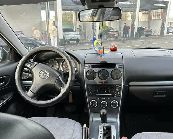 Фиолетовый Мазда 6, объемом двигателя 2.3 л и пробегом 240 тыс. км за 4450 $, фото 17 на Automoto.ua