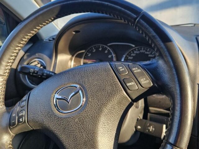 Фиолетовый Мазда 6, объемом двигателя 2 л и пробегом 219 тыс. км за 5000 $, фото 5 на Automoto.ua