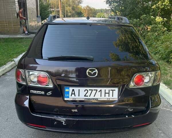 Фиолетовый Мазда 6, объемом двигателя 2 л и пробегом 321 тыс. км за 2900 $, фото 1 на Automoto.ua