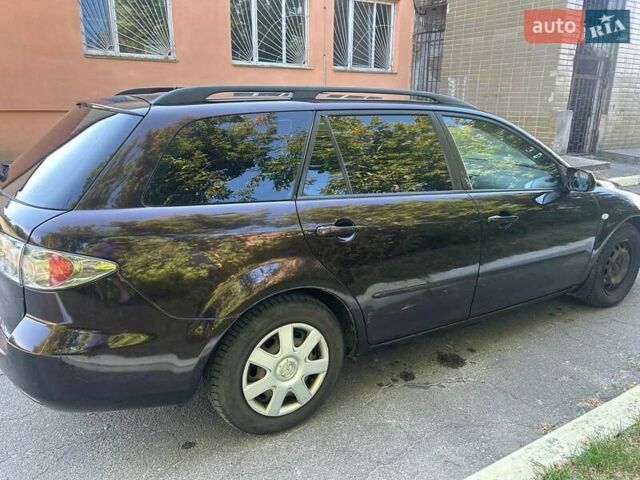 Фиолетовый Мазда 6, объемом двигателя 2 л и пробегом 321 тыс. км за 2900 $, фото 4 на Automoto.ua