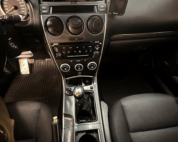 Фиолетовый Мазда 6, объемом двигателя 2 л и пробегом 274 тыс. км за 5300 $, фото 12 на Automoto.ua