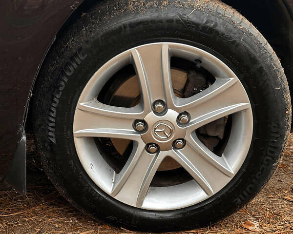 Фиолетовый Мазда 6, объемом двигателя 2 л и пробегом 274 тыс. км за 5300 $, фото 27 на Automoto.ua