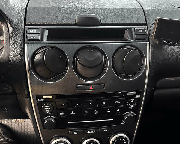 Фиолетовый Мазда 6, объемом двигателя 2 л и пробегом 274 тыс. км за 5300 $, фото 7 на Automoto.ua