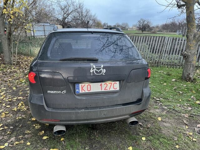 Фиолетовый Мазда 6, объемом двигателя 2 л и пробегом 228 тыс. км за 3650 $, фото 1 на Automoto.ua