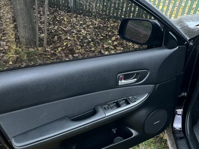 Фиолетовый Мазда 6, объемом двигателя 2 л и пробегом 228 тыс. км за 3650 $, фото 12 на Automoto.ua