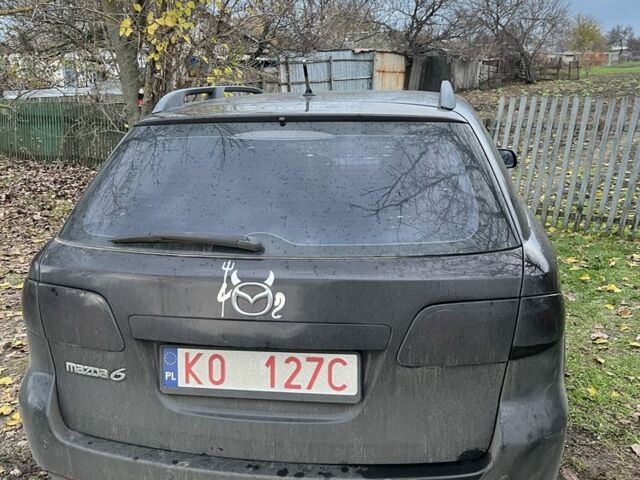 Фиолетовый Мазда 6, объемом двигателя 2 л и пробегом 228 тыс. км за 3650 $, фото 4 на Automoto.ua