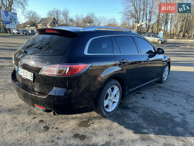 Фиолетовый Мазда 6, объемом двигателя 2.01 л и пробегом 280 тыс. км за 7700 $, фото 6 на Automoto.ua