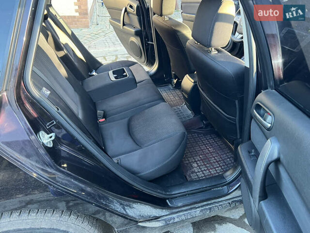 Фиолетовый Мазда 6, объемом двигателя 2.01 л и пробегом 280 тыс. км за 7700 $, фото 65 на Automoto.ua