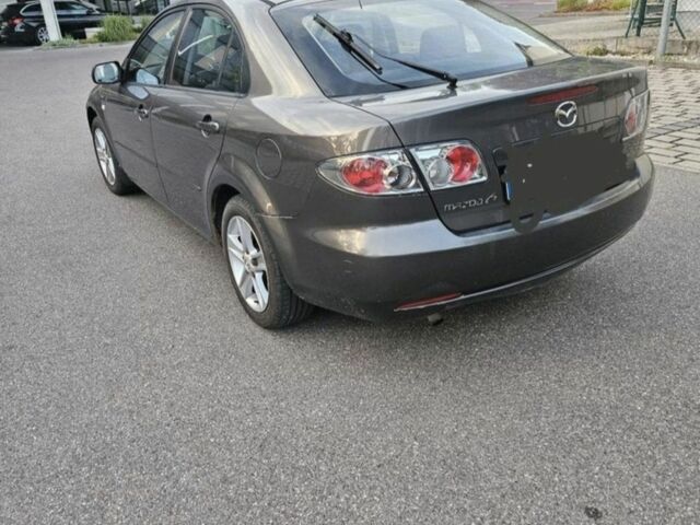 Коричневый Мазда 6, объемом двигателя 2 л и пробегом 240 тыс. км за 2100 $, фото 3 на Automoto.ua
