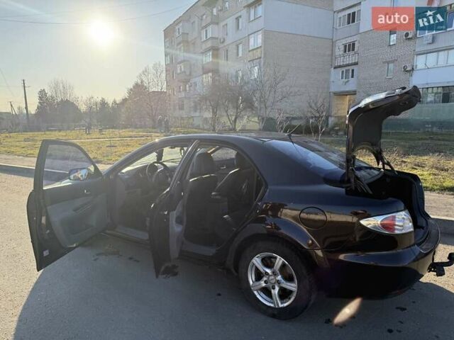 Коричневый Мазда 6, объемом двигателя 1.8 л и пробегом 202 тыс. км за 4200 $, фото 2 на Automoto.ua
