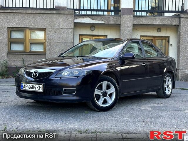 Коричневый Мазда 6, объемом двигателя 2 л и пробегом 309 тыс. км за 5000 $, фото 1 на Automoto.ua