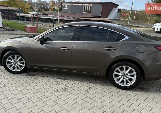 Коричневий Мазда 6, об'ємом двигуна 2.18 л та пробігом 198 тис. км за 12000 $, фото 4 на Automoto.ua