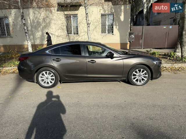 Коричневый Мазда 6, объемом двигателя 2.19 л и пробегом 217 тыс. км за 14999 $, фото 1 на Automoto.ua