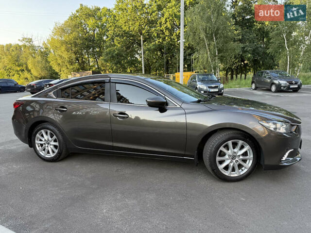 Коричневый Мазда 6, объемом двигателя 2 л и пробегом 158 тыс. км за 14000 $, фото 9 на Automoto.ua