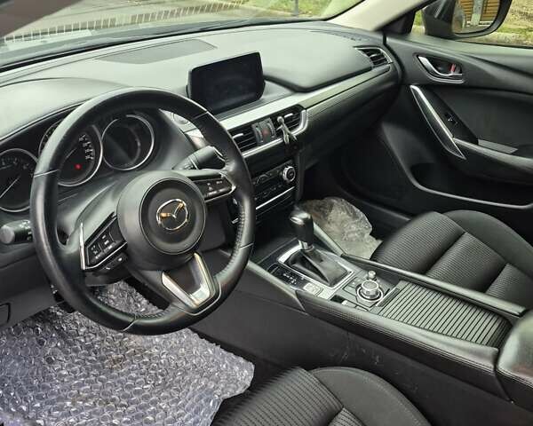 Коричневий Мазда 6, об'ємом двигуна 2 л та пробігом 162 тис. км за 12850 $, фото 19 на Automoto.ua