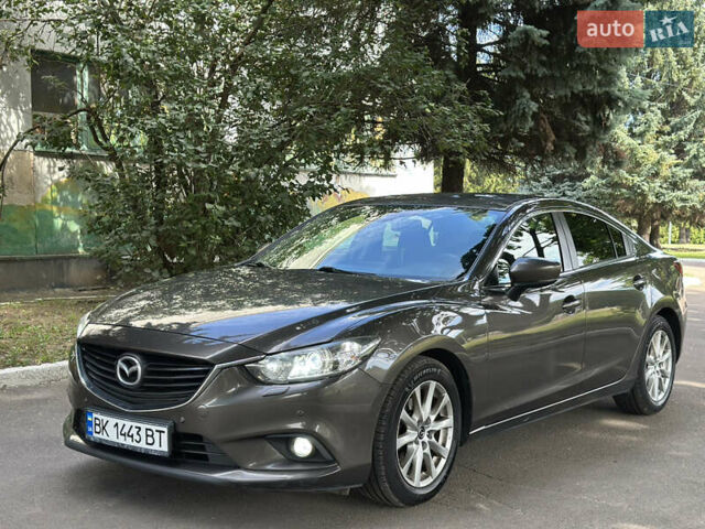 Коричневый Мазда 6, объемом двигателя 2 л и пробегом 144 тыс. км за 17900 $, фото 1 на Automoto.ua
