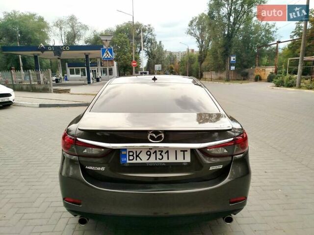 Коричневий Мазда 6, об'ємом двигуна 2.49 л та пробігом 195 тис. км за 11400 $, фото 4 на Automoto.ua