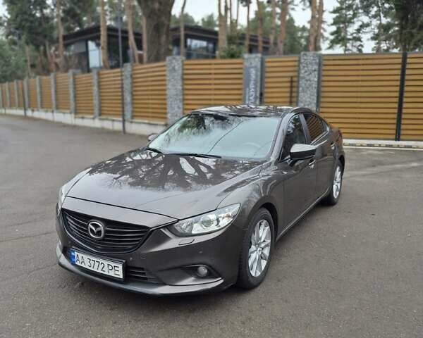 Коричневий Мазда 6, об'ємом двигуна 2 л та пробігом 162 тис. км за 12850 $, фото 9 на Automoto.ua