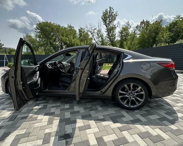 Коричневий Мазда 6, об'ємом двигуна 2 л та пробігом 155 тис. км за 16000 $, фото 9 на Automoto.ua