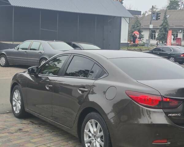 Коричневый Мазда 6, объемом двигателя 2 л и пробегом 127 тыс. км за 14999 $, фото 2 на Automoto.ua