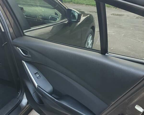 Коричневый Мазда 6, объемом двигателя 2 л и пробегом 233 тыс. км за 16500 $, фото 25 на Automoto.ua