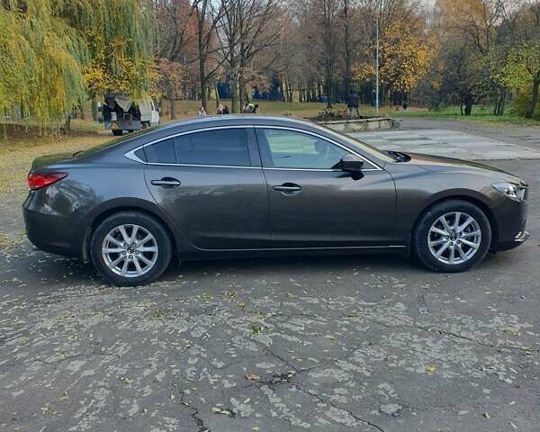 Коричневый Мазда 6, объемом двигателя 2 л и пробегом 233 тыс. км за 16500 $, фото 5 на Automoto.ua