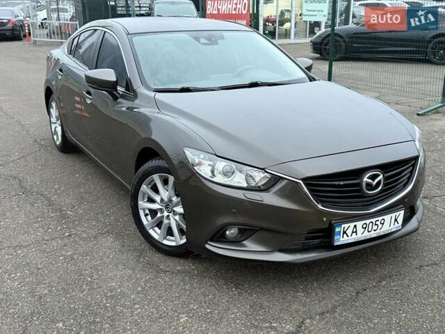 Коричневий Мазда 6, об'ємом двигуна 2 л та пробігом 198 тис. км за 13300 $, фото 6 на Automoto.ua