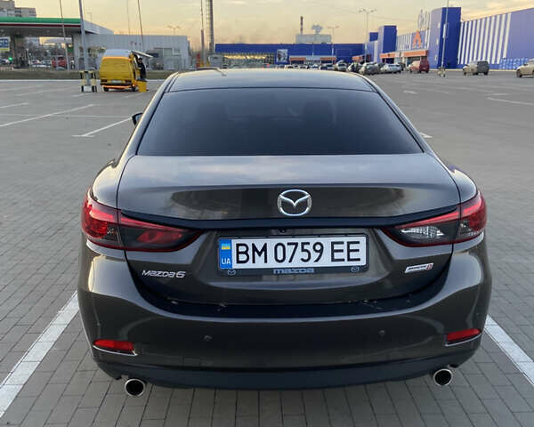 Коричневый Мазда 6, объемом двигателя 2.2 л и пробегом 118 тыс. км за 17200 $, фото 11 на Automoto.ua