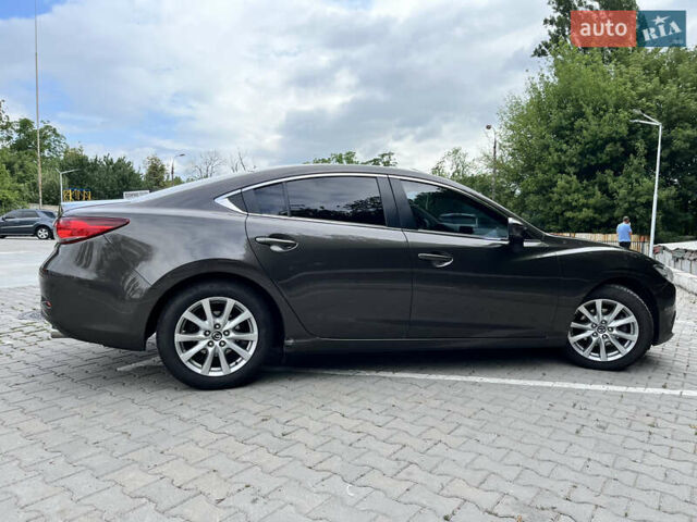 Коричневий Мазда 6, об'ємом двигуна 2 л та пробігом 157 тис. км за 13490 $, фото 1 на Automoto.ua