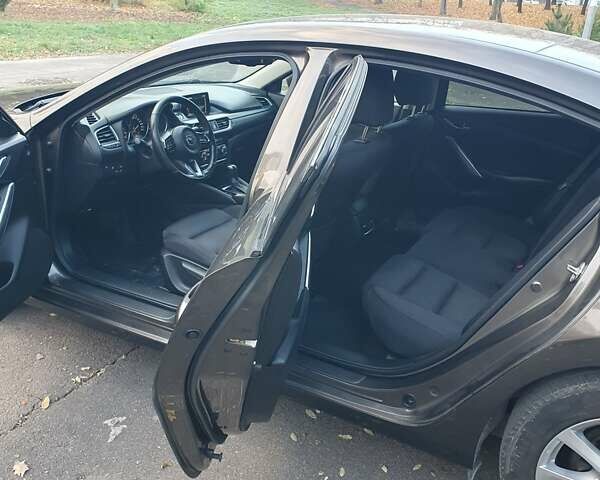 Коричневый Мазда 6, объемом двигателя 2 л и пробегом 233 тыс. км за 16500 $, фото 29 на Automoto.ua