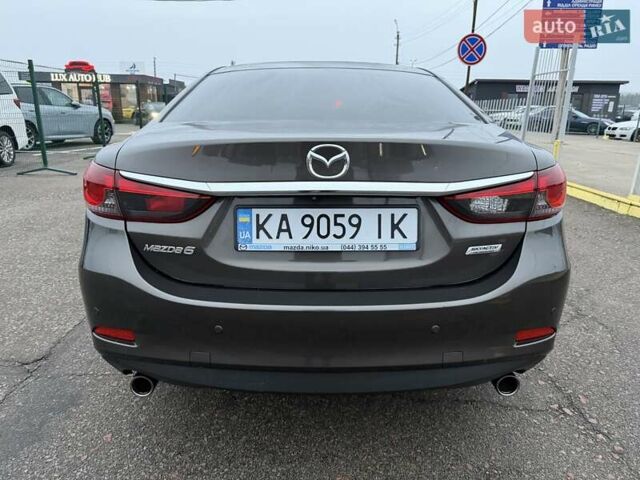 Коричневий Мазда 6, об'ємом двигуна 2 л та пробігом 198 тис. км за 13300 $, фото 4 на Automoto.ua