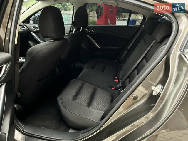Коричневий Мазда 6, об'ємом двигуна 2 л та пробігом 157 тис. км за 13490 $, фото 3 на Automoto.ua