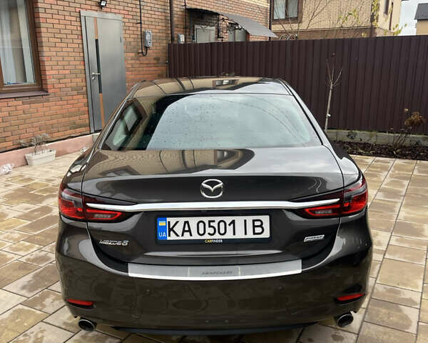 Коричневий Мазда 6, об'ємом двигуна 2 л та пробігом 87 тис. км за 18500 $, фото 11 на Automoto.ua