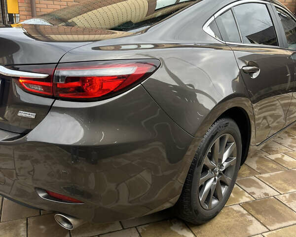 Коричневий Мазда 6, об'ємом двигуна 2 л та пробігом 87 тис. км за 18500 $, фото 16 на Automoto.ua