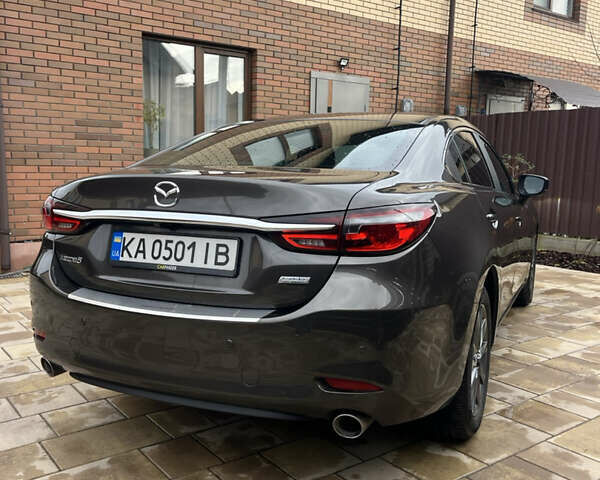 Коричневый Мазда 6, объемом двигателя 2 л и пробегом 87 тыс. км за 19999 $, фото 12 на Automoto.ua