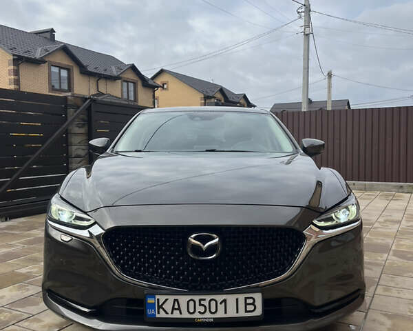 Коричневый Мазда 6, объемом двигателя 2 л и пробегом 87 тыс. км за 19999 $, фото 4 на Automoto.ua