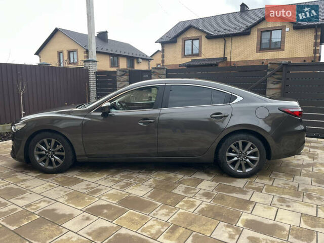 Коричневий Мазда 6, об'ємом двигуна 2 л та пробігом 87 тис. км за 18500 $, фото 13 на Automoto.ua