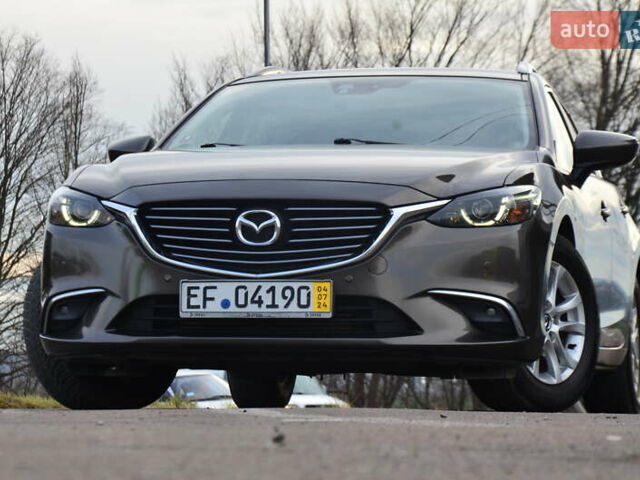 Коричневый Мазда 6, объемом двигателя 2.2 л и пробегом 251 тыс. км за 13950 $, фото 12 на Automoto.ua