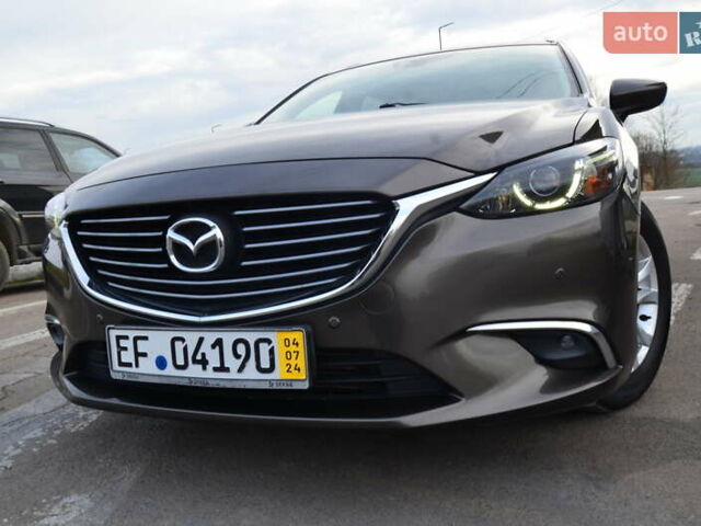 Коричневый Мазда 6, объемом двигателя 2.2 л и пробегом 251 тыс. км за 13950 $, фото 1 на Automoto.ua