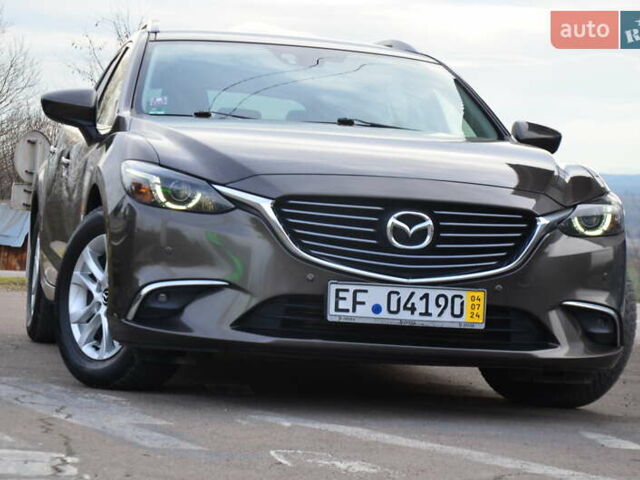 Коричневый Мазда 6, объемом двигателя 2.2 л и пробегом 251 тыс. км за 13950 $, фото 22 на Automoto.ua