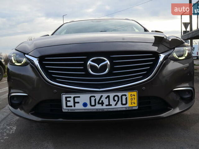 Коричневый Мазда 6, объемом двигателя 2.2 л и пробегом 251 тыс. км за 13950 $, фото 16 на Automoto.ua