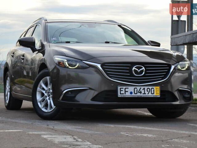 Коричневый Мазда 6, объемом двигателя 2.2 л и пробегом 251 тыс. км за 13950 $, фото 24 на Automoto.ua