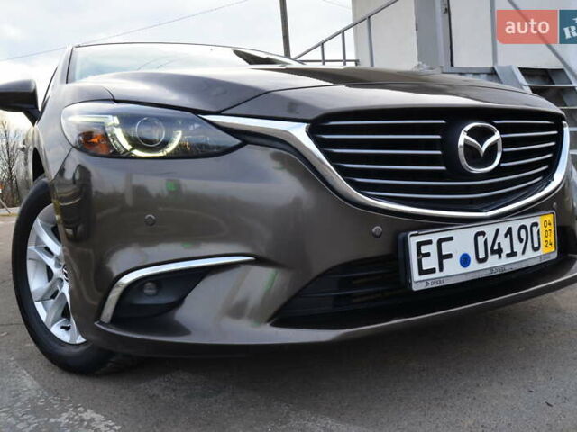 Коричневый Мазда 6, объемом двигателя 2.2 л и пробегом 251 тыс. км за 13950 $, фото 18 на Automoto.ua