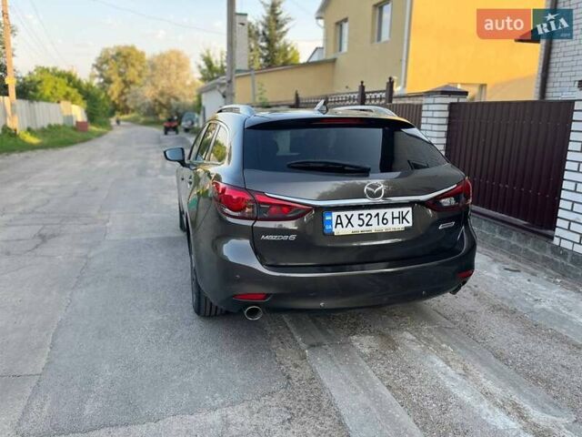 Коричневый Мазда 6, объемом двигателя 2 л и пробегом 121 тыс. км за 15300 $, фото 7 на Automoto.ua